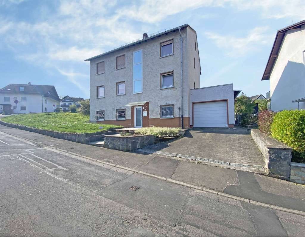 Immobilie in Gießen - Attraktive Investitionsmöglichkeit – Zweifamilienhaus mit Potenzial - Bild 1