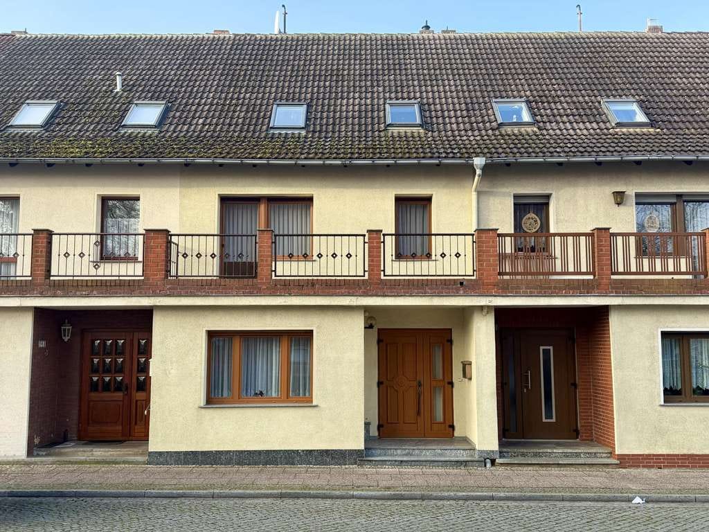 Immobilie in Wittenberge - Reihenmittelhaus mit Gartenidylle im Stadtkern von Wittenberge – nur wenige Schritte von der Elbe  - Bild 0