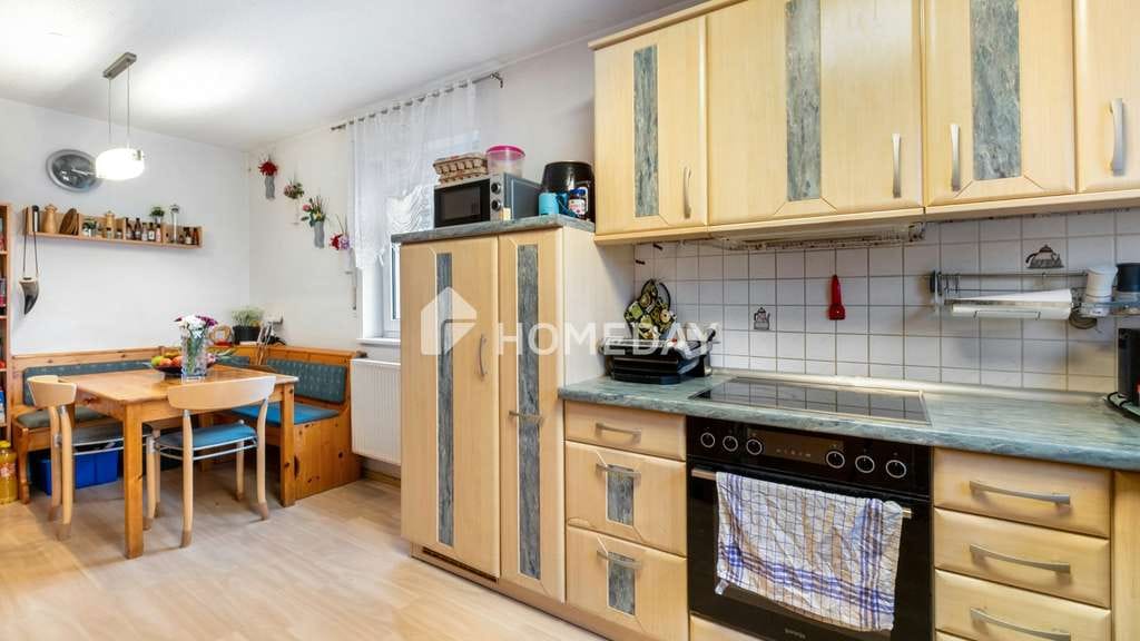 Immobilie in Kleinaitingen - Einfamilienhaus mit durchdachter Raumaufteilung, Terrasse und Balkon in familienfreundlicher Lage - Bild 1