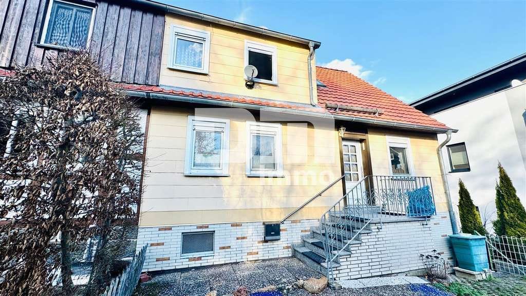Immobilie in Habichtswald - Schöne Doppelhaushälfte mit Nebengebäude, Garage und angelegtem Gartenbereich - Bild 1
