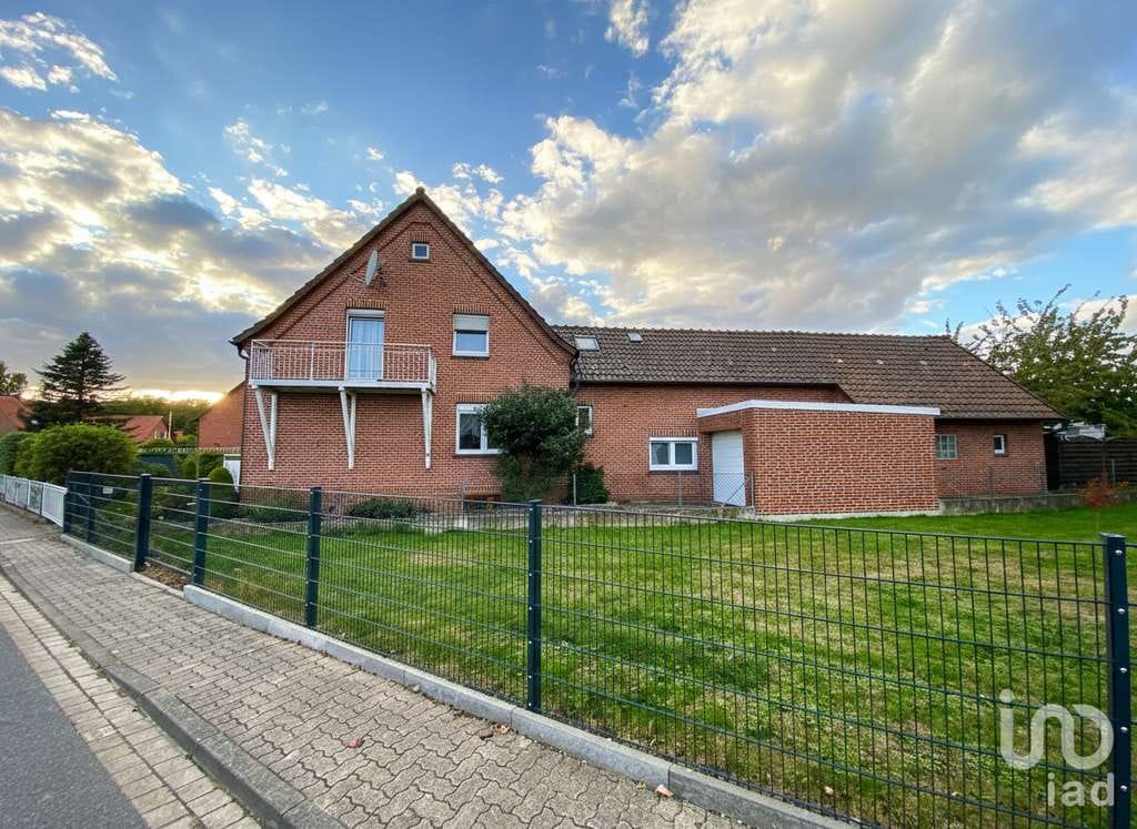 Immobilie in Holle - Haus mit großem Grundstück und 3 Garagen. Perfekt für Familien, Mehrgenerationen & Vermietung. - Bild 1