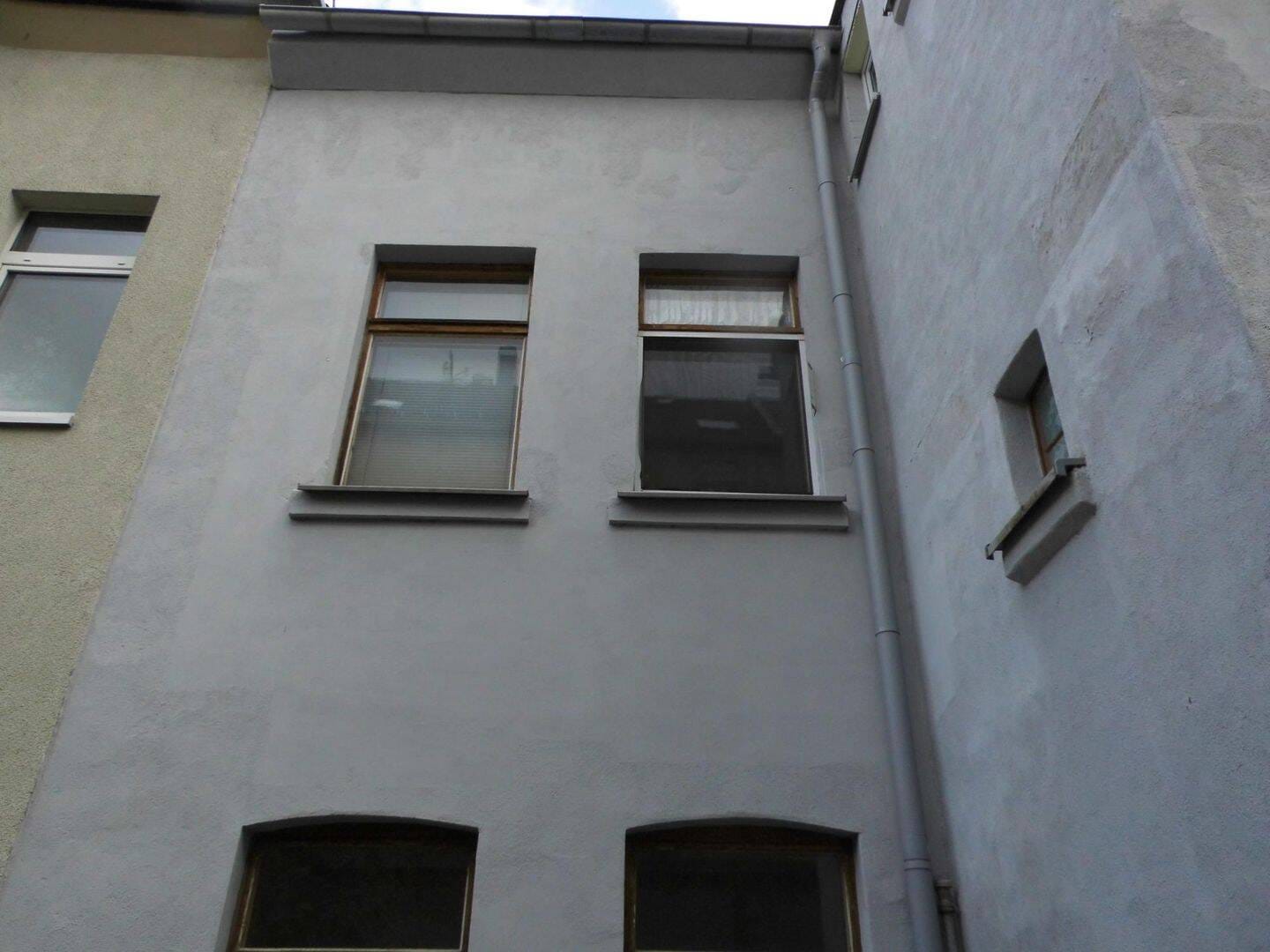 Immobilie in Reichenbach - 1-2-Familien-Reihenhaus mit Garage im Haus in ruhiger Stadtlage von Reichenbach OT Mylau. - Bild 1