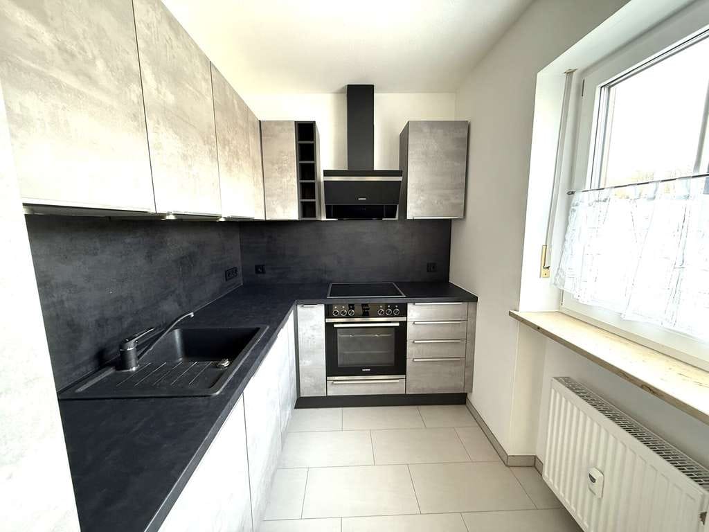 Immobilie in Trostberg - zentral gelegene neuwertige 2-Zimmer-Wohnung mit Aufzug und TG sofort beziehbar - Bild 3