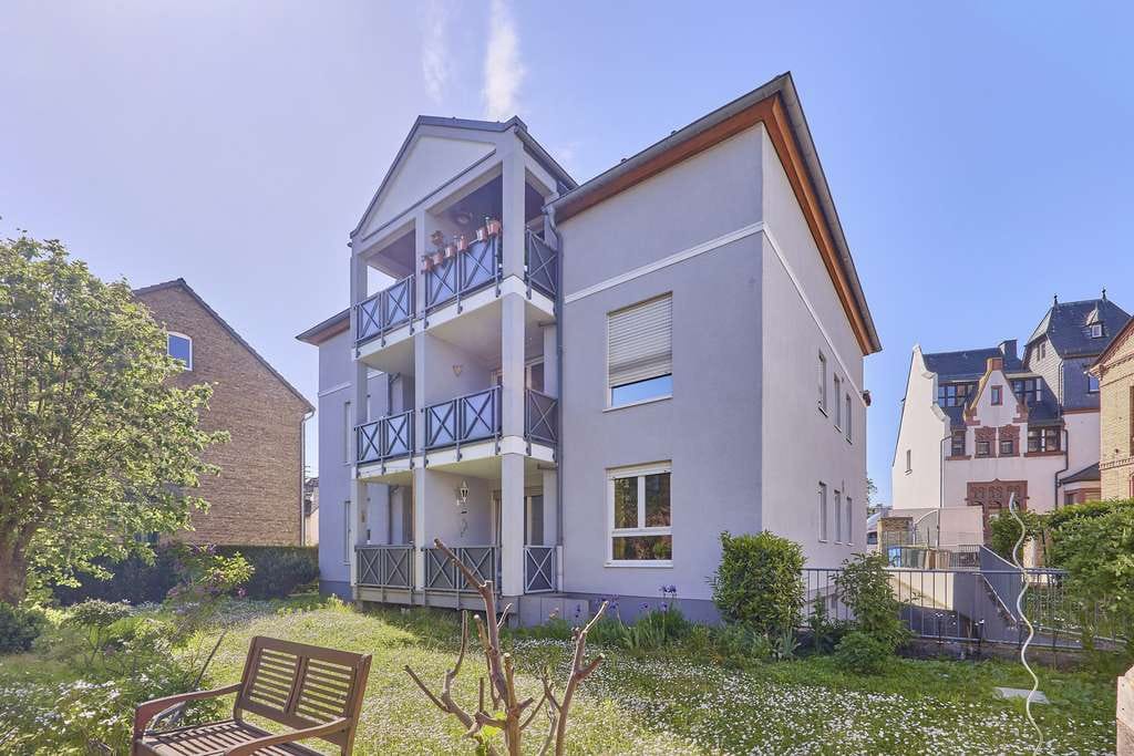 Immobilie in Oestrich-Winkel - Helle 2-Zimmer Wohnung mit Balkon, TG-Stellplatz und Gestaltungspotenzial - Bild 1