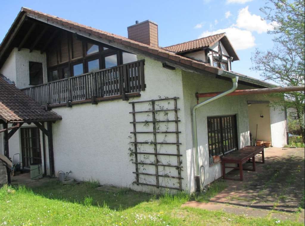 Immobilie in Wölfersheim - Einfamilienhaus direkt an Feld und Streuobstwiesen - Bild 1