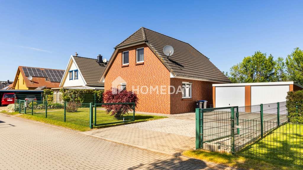 Immobilie in Bentwisch - Viel Platz für die Familie: Einfamilienhaus mit vier Schlafzimmern und sonnigem Garten - Bild 0