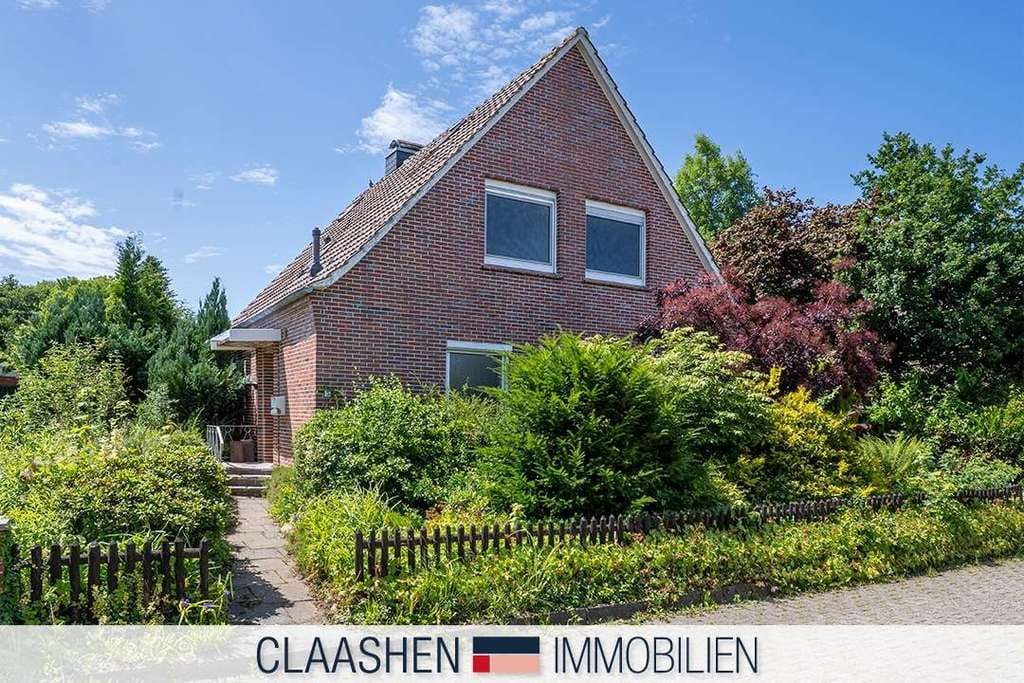Immobilie in Lütetsburg - Einfamilienhaus mit Baugrundstück - Bild 0