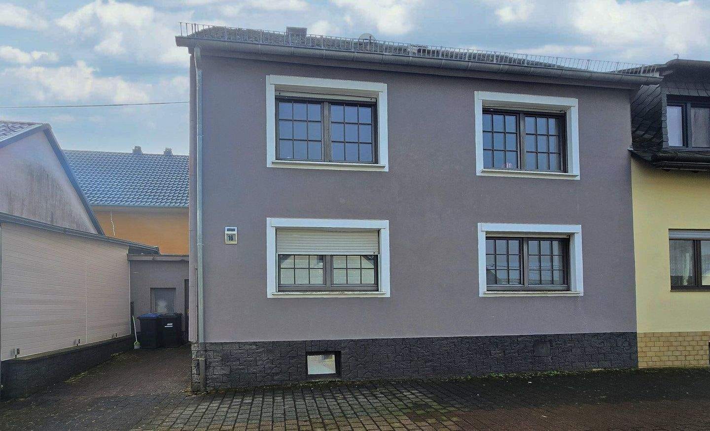 Immobilie in Hermeskeil - Charmante Doppelhaushälfte - vermietet und voller Möglichkeiten - Bild 1