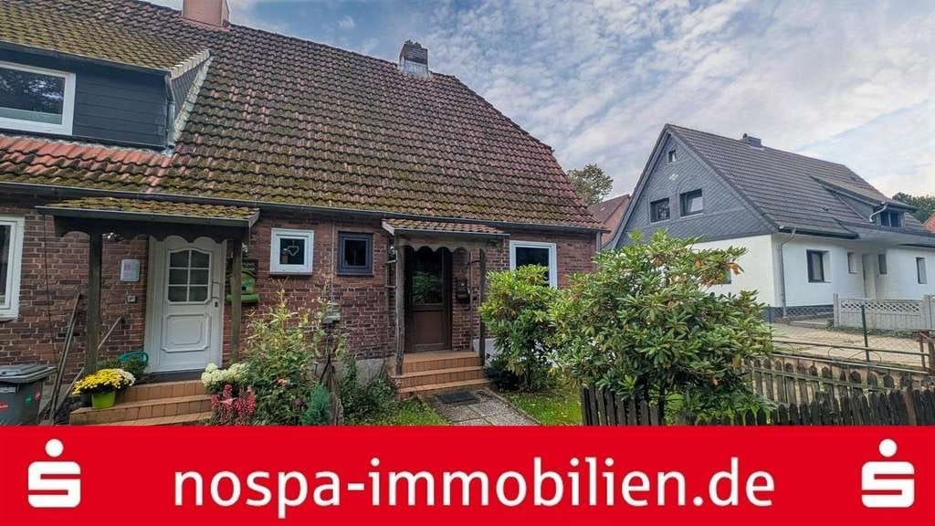 Immobilie in Schleswig - Kleines Reihenendhaus mit eigenem Grundstück und Stellplatz in zentraler Lage von Schleswig - Bild 0