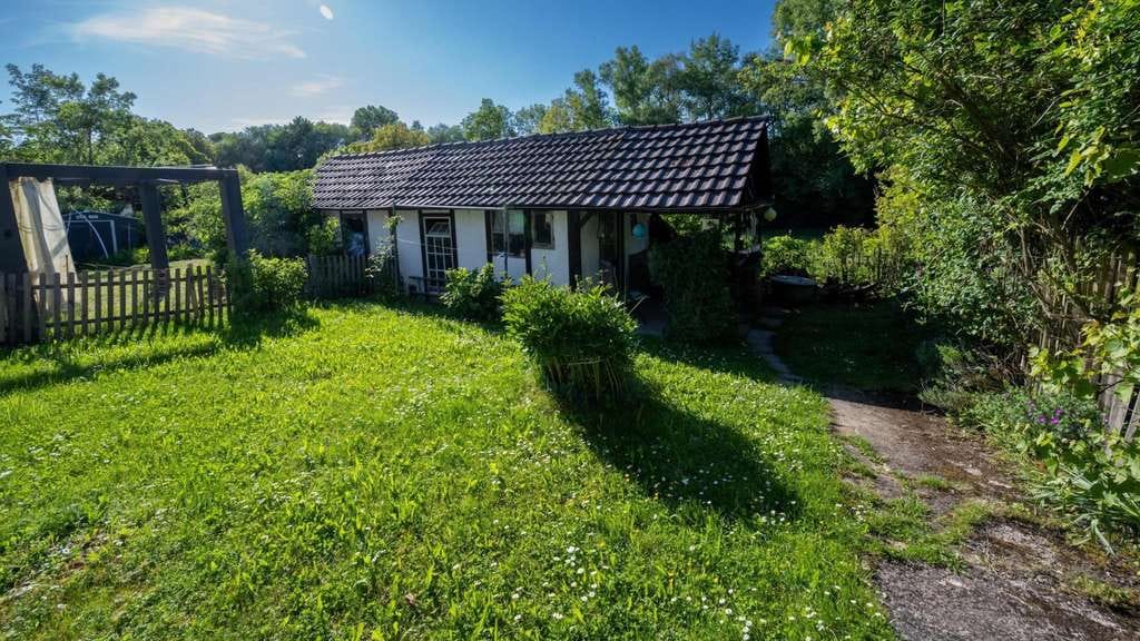 Immobilie in Herrenberg - Sonnige Erdgeschosswohnung mit viel Platz, eigenem Garten, Terrasse und Balkon! - Bild 2