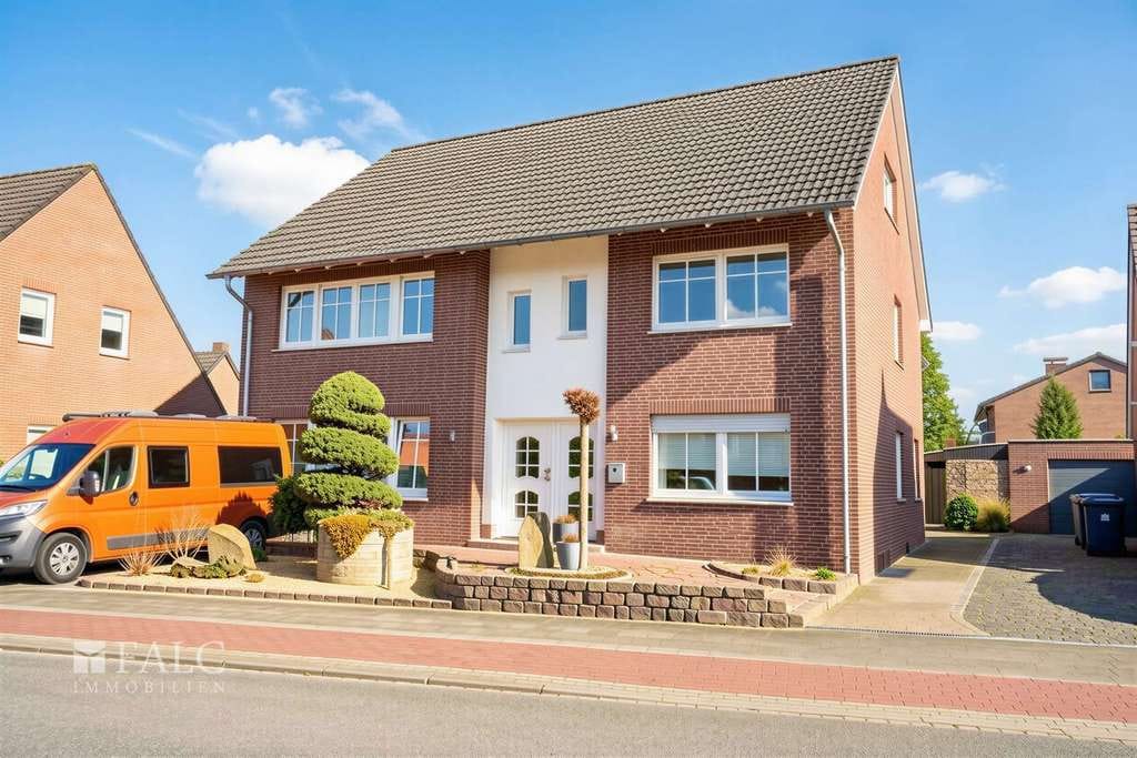 Immobilie in Saerbeck - Zwei Wohnwelten unter einem Dach! Freistehendes Einfamilienhaus mit Einliegerwohnung - Bild 1