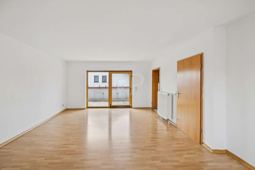 Immobilie in Mehlingen - Gepflegte Maisonettewohnung mit Dachterrasse in ruhiger Wohnlage - Bild 1