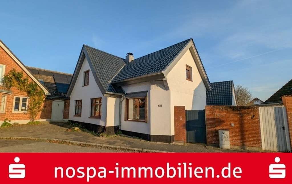 Immobilie in Arnis - Zwei Wohnhäuser auf einem Grundstück mit Garage und Carport - Nahe der Schlei! - Bild 0