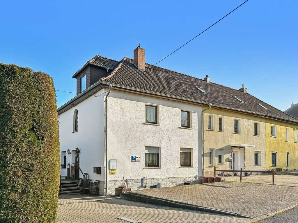 Immobilie in Mücheln (Geiseltal) - Charmantes Reihenendhaus mit historischem Flair und vielseitigen Nutzungsmöglichkeiten in Mücheln - Bild 1