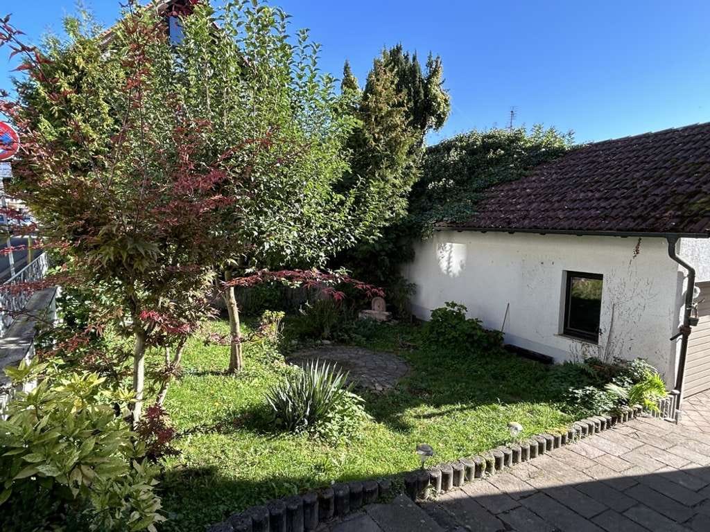 Immobilie in Obernburg am Main - Zentral wohnen, ruhig leben ... Charmantes Einfamilienhaus mit Garten! - Bild 3