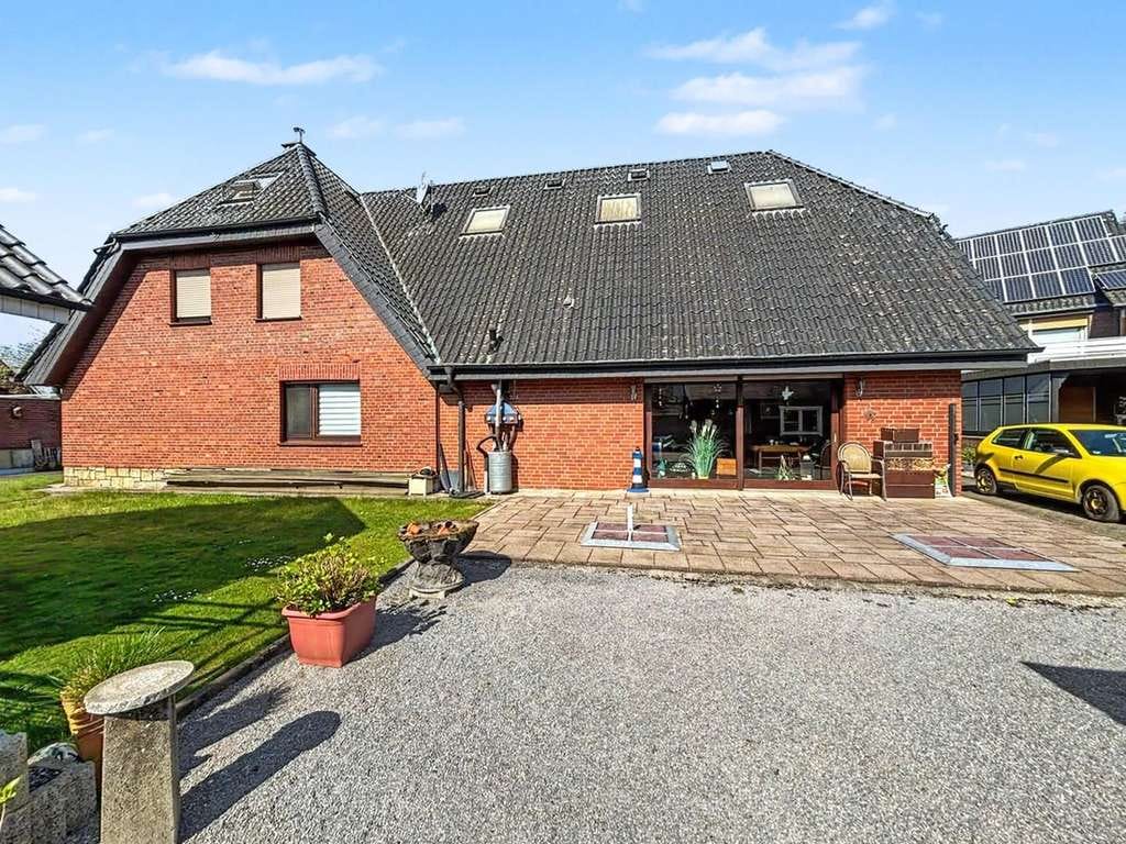 Immobilie in Ibbenbüren - Charmantes Zweifamilienhaus mit großem Grundstück in ruhiger Lage von Ibbenbüren-Dörenthe - Bild 1