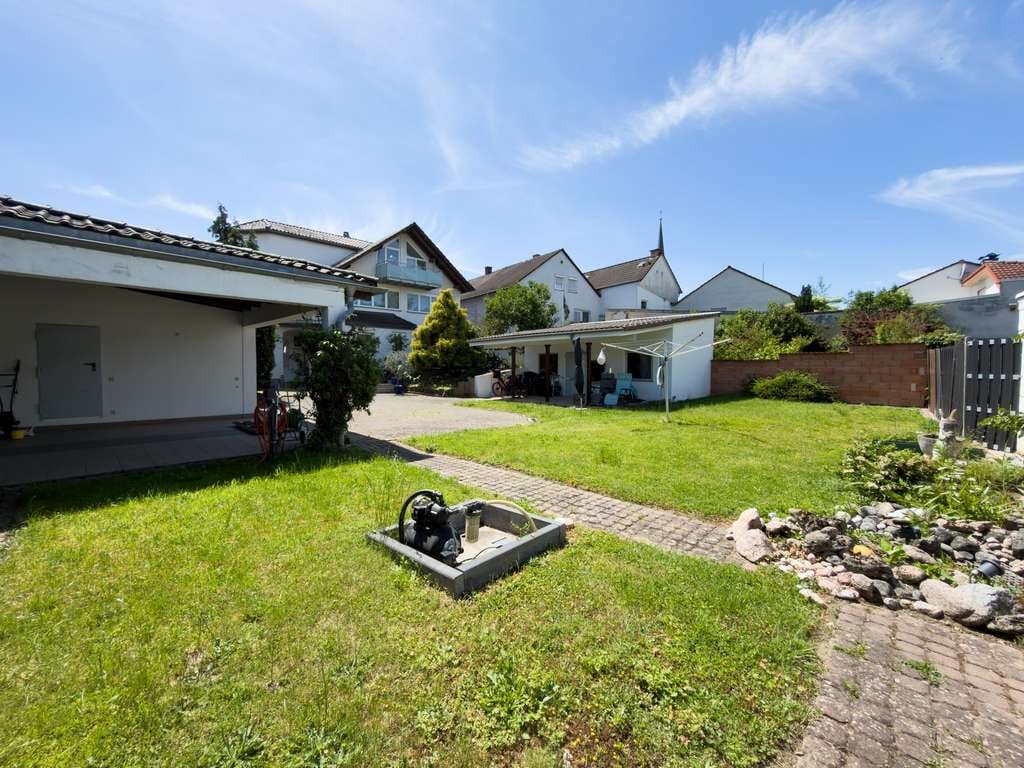 Immobilie in Seligenstadt - Gepflegtes Dreifamilienhaus mit drei großzügigen Wohneinheiten und vielseitigem Nutzungspotenzial - Bild 3