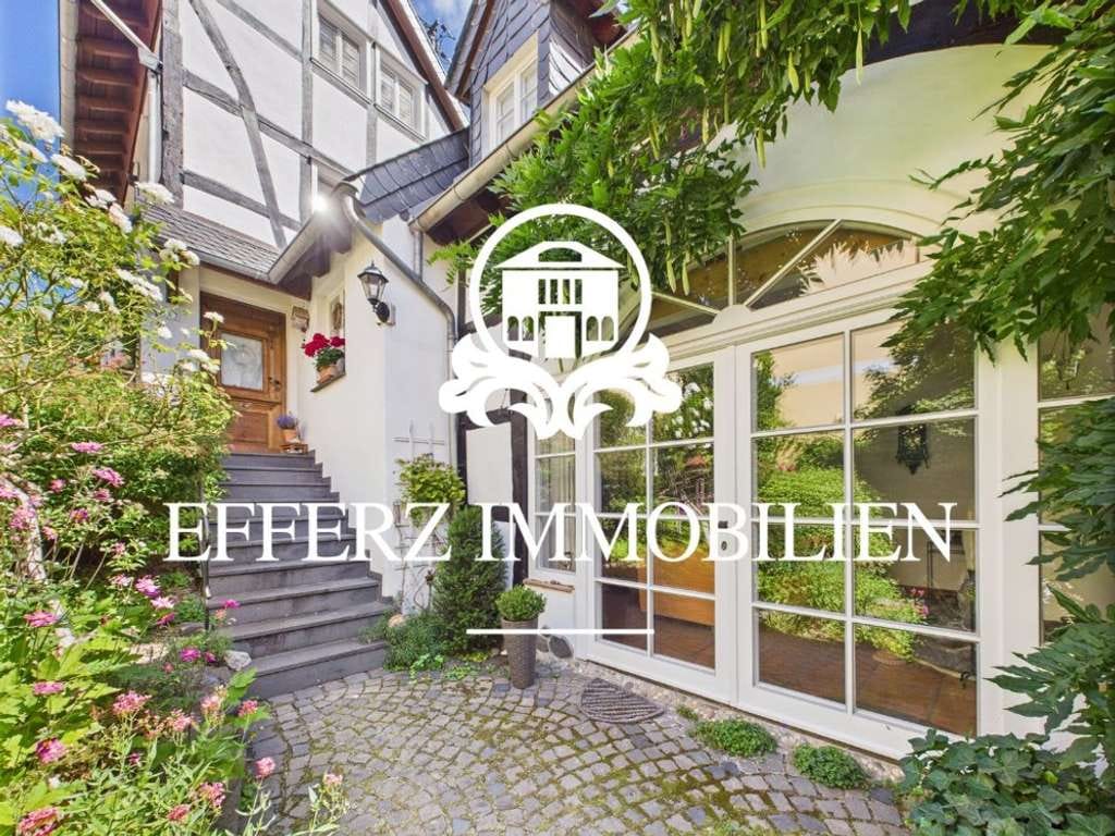 Immobilie in Remagen - Zeitlose Eleganz: Denkmalgeschütztes Fachwerkjuwel in Split-Level-Architektur! - Bild 0