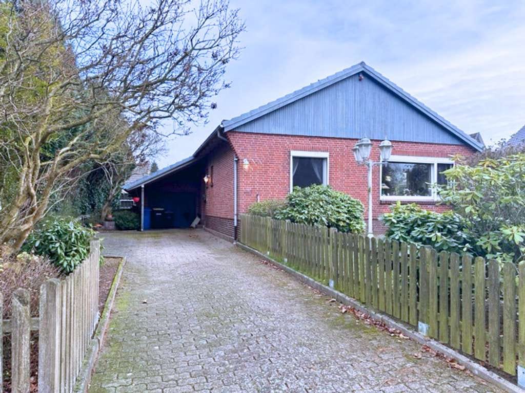 Immobilie in Lohe-Rickelshof - Ihr Haus in Lohe-Rickelshof: ebenerdiger Satteldach-Bungalow mit Einliegerwhg. in ruhiger Lage - Bild 1