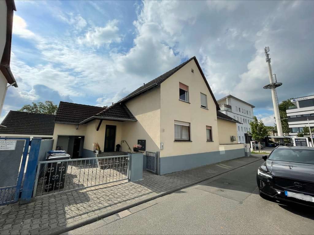 Immobilie in Langen - Wohn- und Geschäftshaus in zentraler Stadtlage von Langen - Bild 0