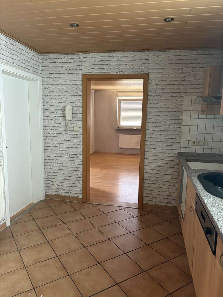 Immobilie in Karlsdorf-Neuthard - Zweifamilienhaus mit attraktiver Vermietungsperspektive - Bild 2