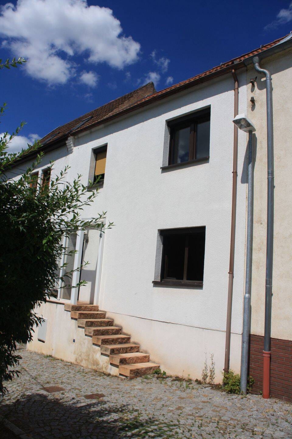 Immobilie in Unterwellenborn - Kleines Haus mit mit Blick und Südhang in Könitz/Thüringen - Bild 0