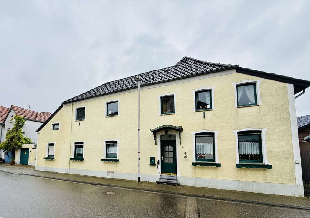 Immobilie in Geilenkirchen - Gemütliches Einfamilienhaus - mit Garage und Innenhof in Geilenkirchen-Immendorf - Bild 1