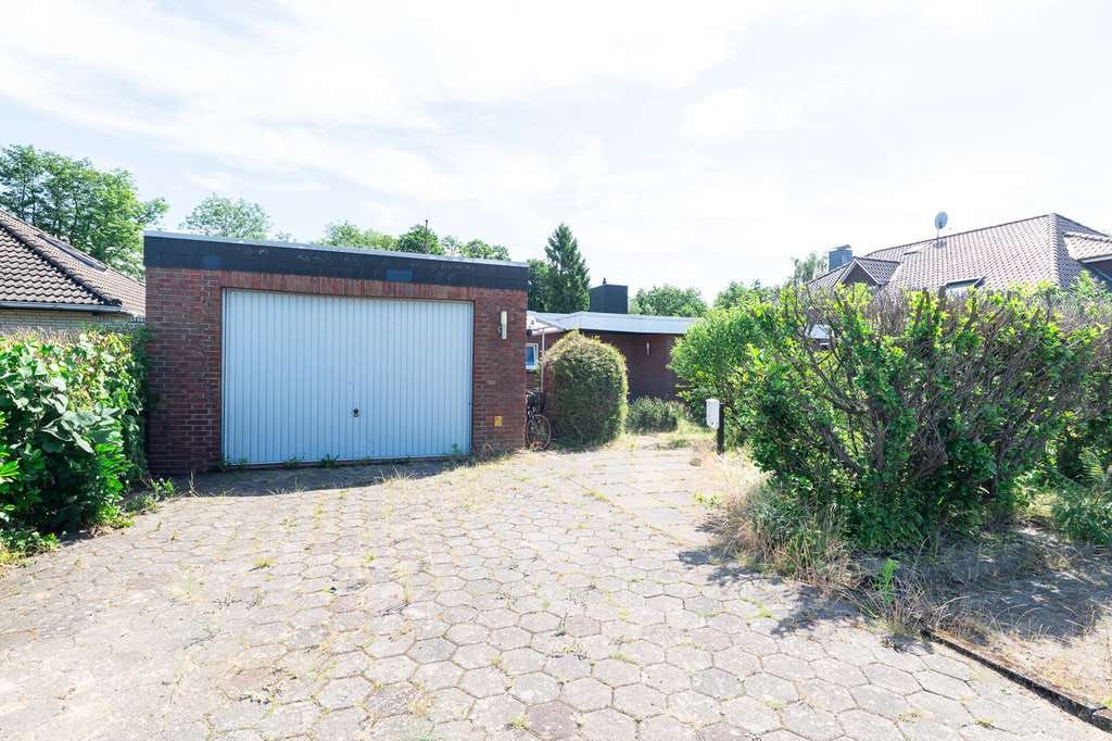 Immobilie in Fredenbeck - Familienfreundliches Split-Level-Haus mit Kamin, Souterrain und großem Garten am Naturschutzgebiet - Bild 2