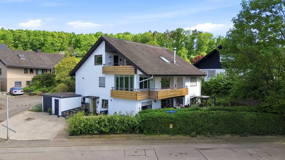 Immobilie in Rümmingen - Lichtdurchflutete Erdgeschosswohnung mit Kamin, Balkon & Wintergarten in ruhiger Lage - Bild 2