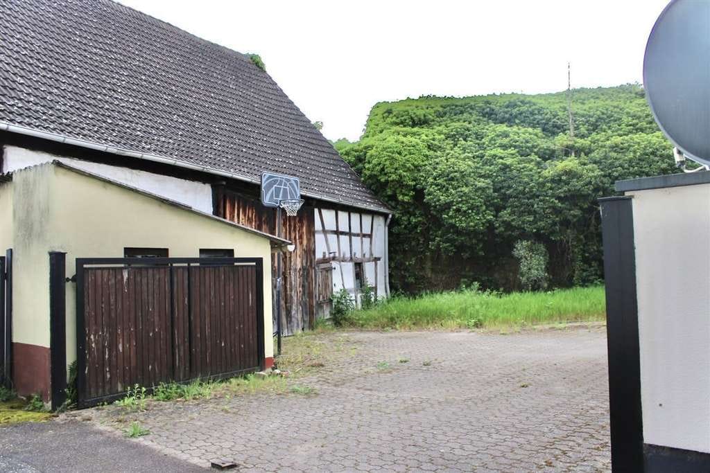 Immobilie in Biblis - Vielseitiges EFH mit Ausbaureserve, Scheune & großem Potenzial in zentraler Lage von Biblis - Bild 2