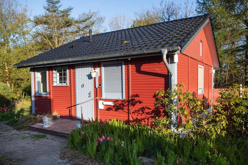 Immobilie in Bünsdorf - Holz-Ferienhaus am Wittensee – Naturnahes Wohnen in Bünsdorf - Bild 0