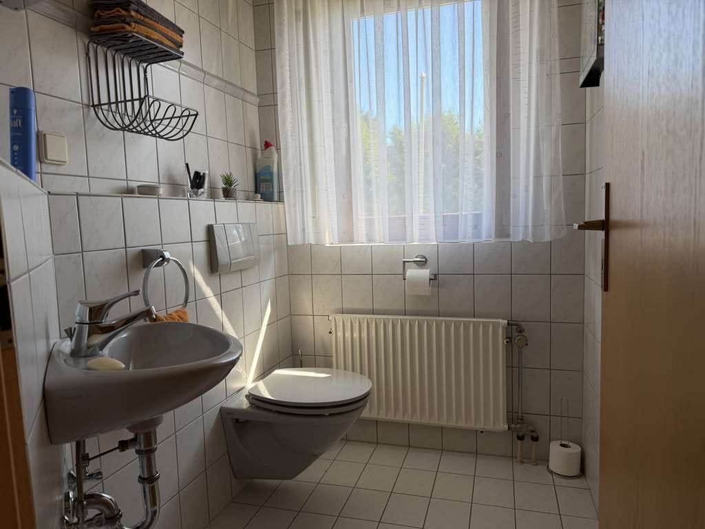 Immobilie in Brohl-Lützing - Familienfreundliches Einfamilienhaus in ruhiger Hanglage mit Garage - Bild 3
