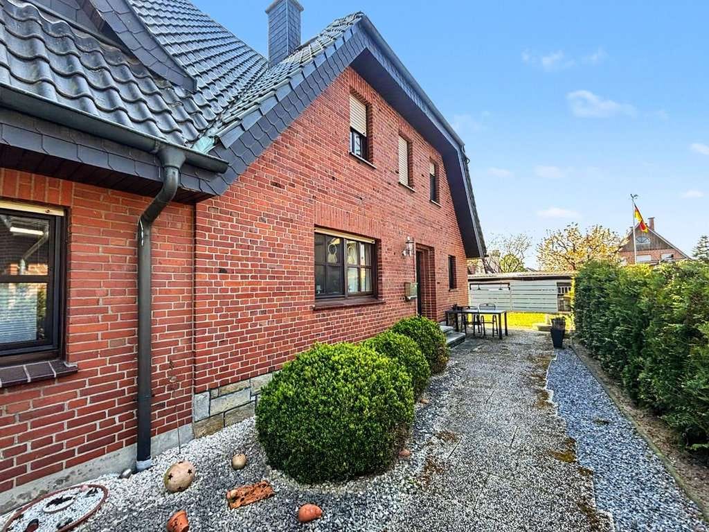 Immobilie in Ibbenbüren - Charmantes Zweifamilienhaus mit großem Grundstück in ruhiger Lage von Ibbenbüren-Dörenthe - Bild 2