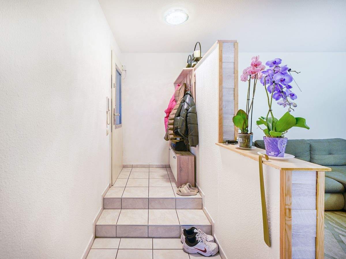 Immobilie in Karlsdorf-Neuthard - Helle Souterrainwohnung mit 2 Terrassen - gute Rendite & sichere Vermietung - Bild 1