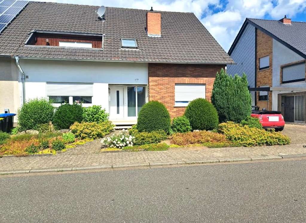 Immobilie in Püttlingen - großzügiges einseitig angebautes Einfamilienhaus in ruhiger Lage in Püttlingen - Bild 0