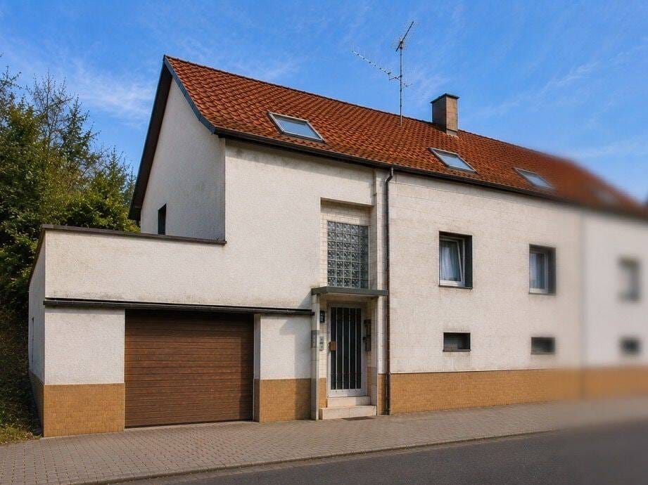 Immobilie in Rieschweiler-Mühlbach - Raum für Ideen - Doppelhaushälfte mit großem Entwicklungspotenzial - Bild 0