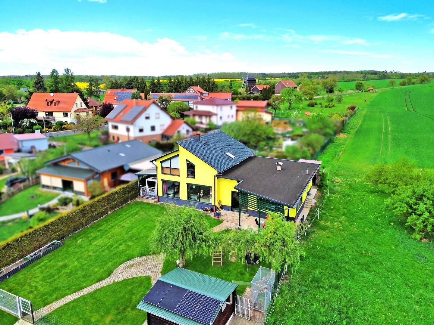 Immobilie in Hörselberg-Hainich - Ruheoase am Feldrand - Großzügiges Familienhaus in nahezu Alleinlage - Bild 2