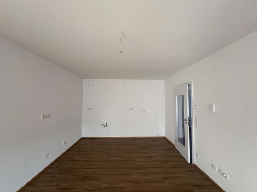 Immobilie in Ergoldsbach - Moderne 2-Zimmer-Wohnung mit Balkon & TG-Stellplatz in ruhiger Lage - Bild 1