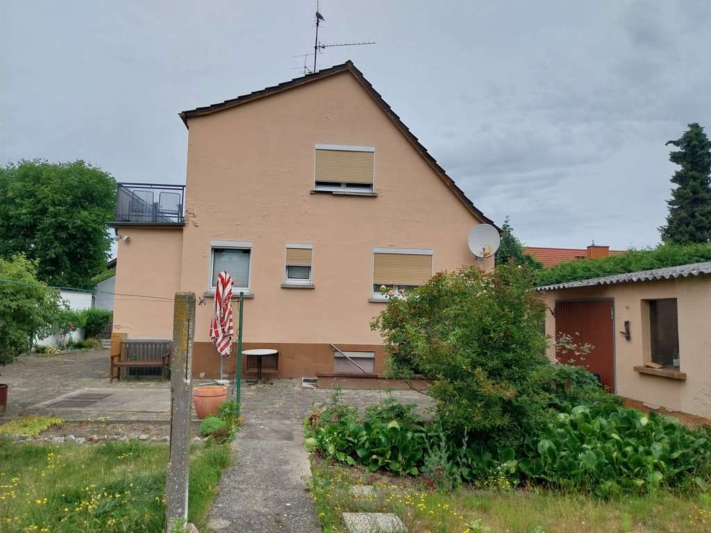 Immobilie in Biblis - Familienfreundliches Einfamilienhaus mit Charme - Bild 2