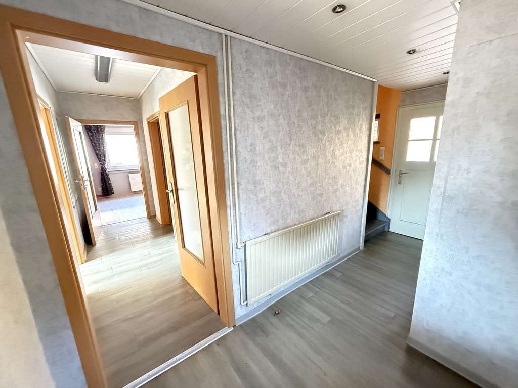 Immobilie in Zetel - Vorne gut erreichbar, hinten grüner Rückzugsort – Haus mit Gewerbe & großem Grundstück - Bild 4