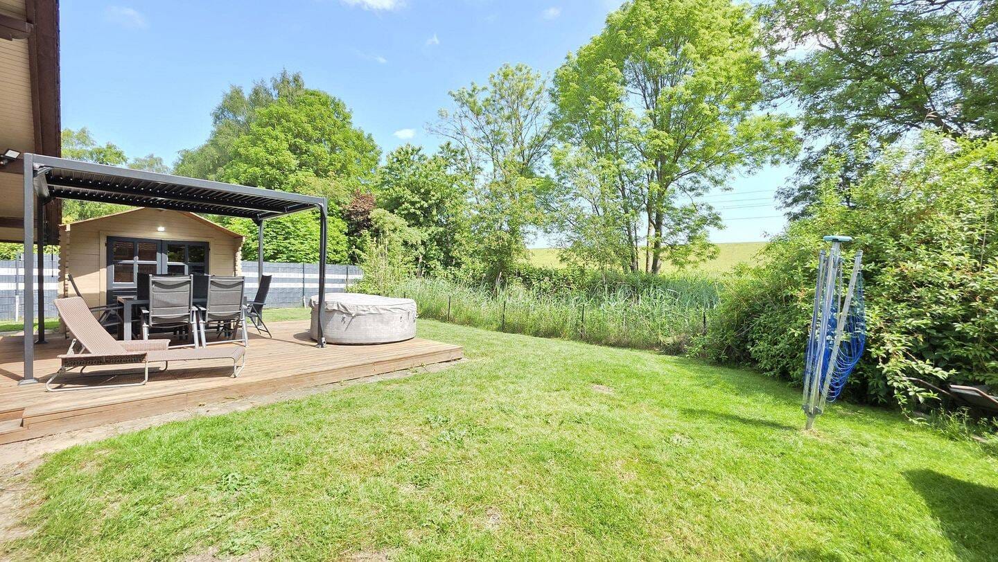 Immobilie in Stadland - Energieeffizientes Blockbohlenhaus mit traumhaftem Garten, Sauna & Blick Richtung Deich - Bild 3