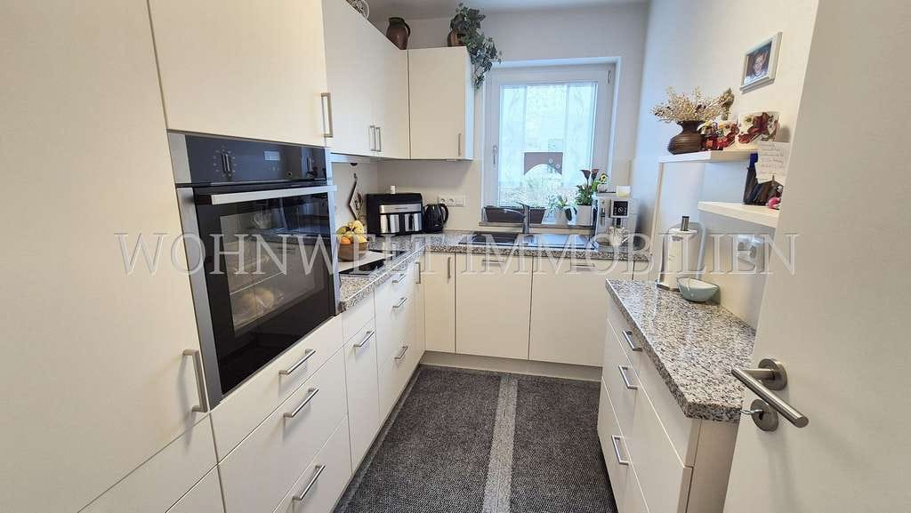 Immobilie in Neufahrn in Niederbayern - Helle, barrierefreie 2-Zi.-EG-Wohnung mit gepflegtem Garten - Bild 4