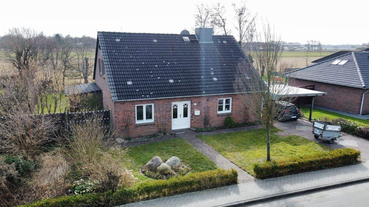 Immobilie in Koldenbüttel - Charmantes Einfamilienhaus mit sonnigem Garten und Wohnflächenreserve im Dachgeschos - Bild 0