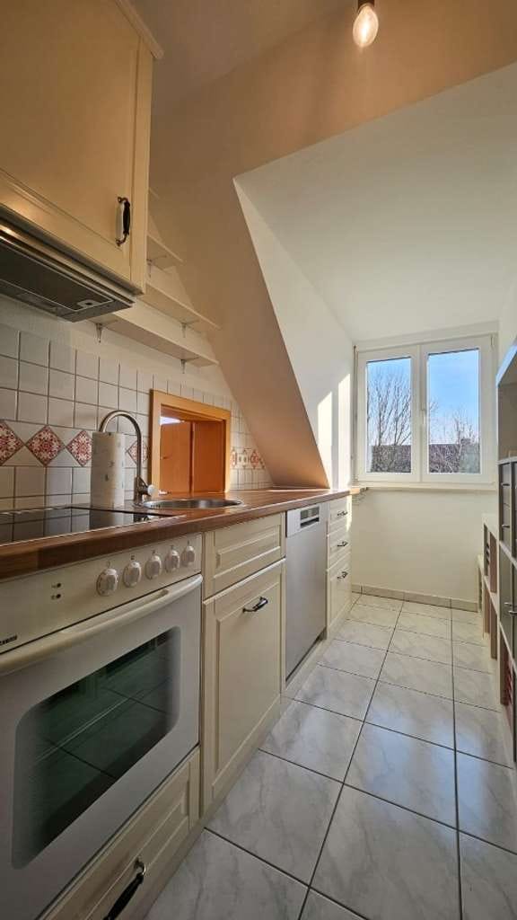 Immobilie in Hallbergmoos - Helle 2-Zimmer-Dachgeschosswohnung mit Galerie und Balkon in ruhiger Lage in Hallbergmoos - Bild 3