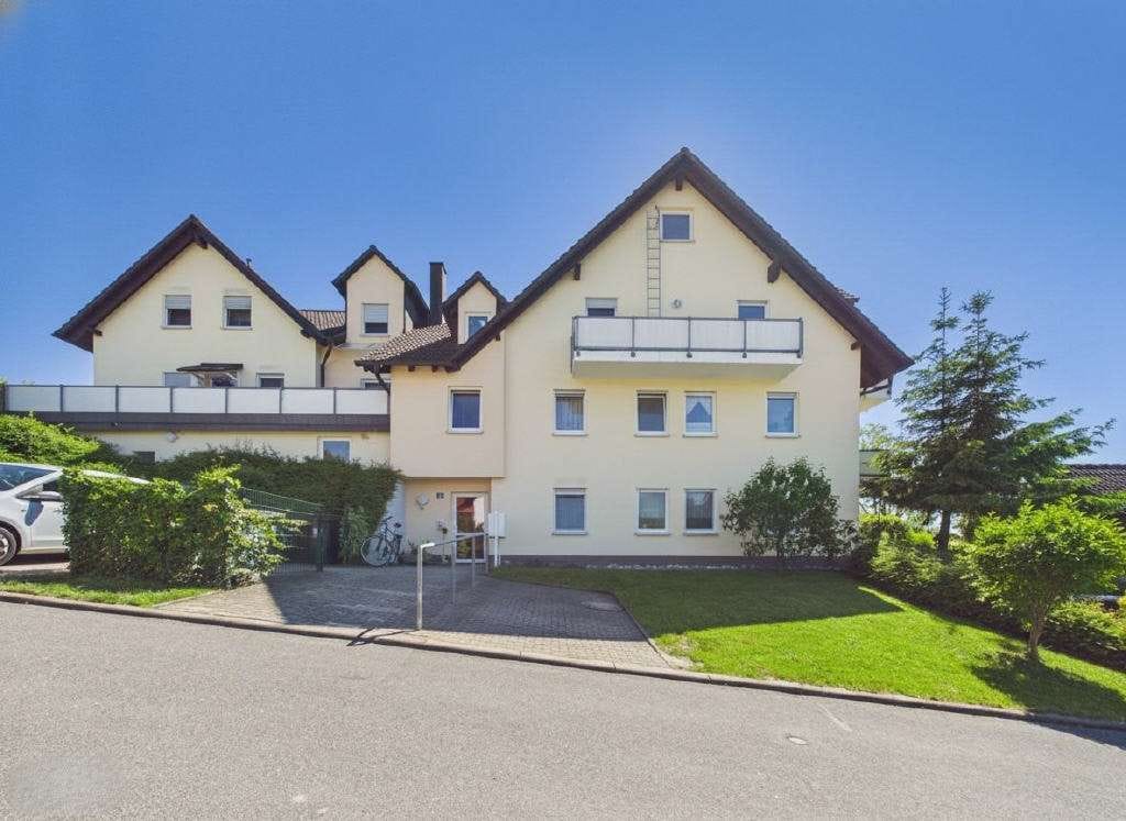 Immobilie in Meeder - Split-Level-Erdgeschosswohnung 
mit Terrasse, Garten und Garage in ruhiger Lage - Bild 0