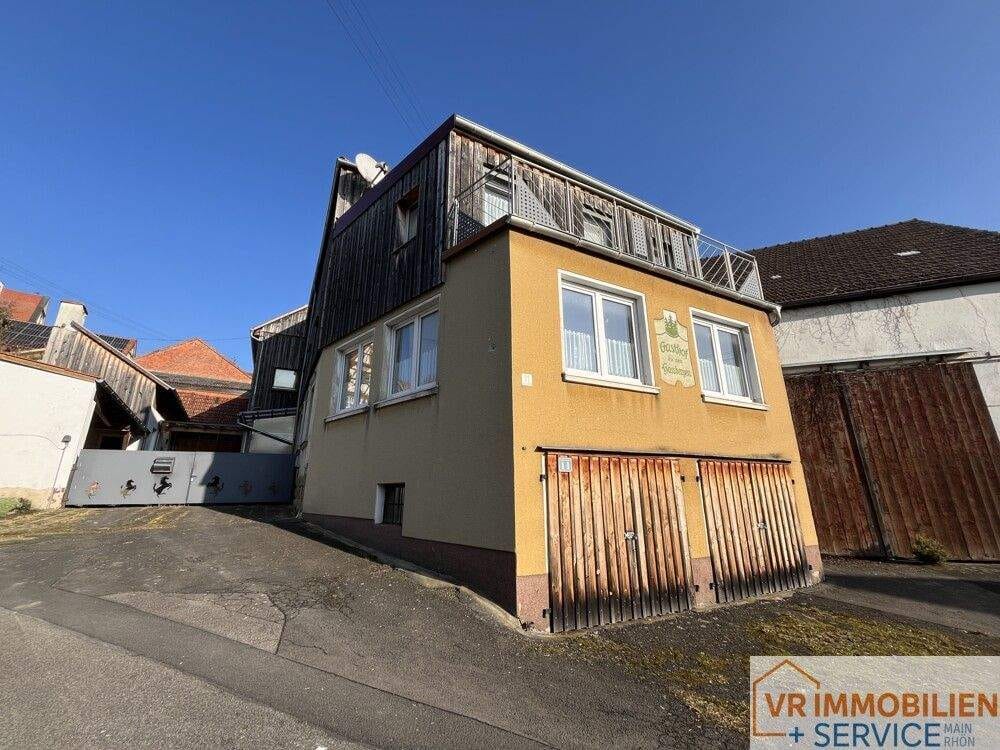 Immobilie in Stadtlauringen - Ein Ort mit Raum für Ideen: Großes Wohnhaus mit Nebengebäuden in naturnaher Lage - 97488 Birnfeld - Bild 0