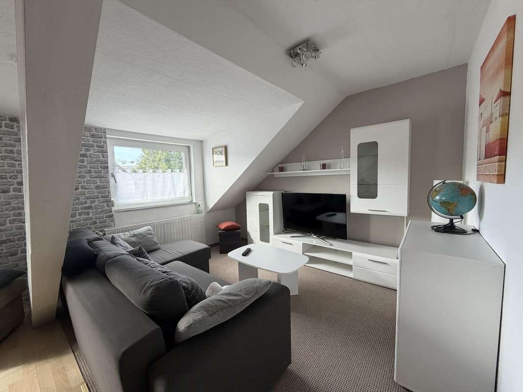Immobilie in Bad Neuenahr-Ahrweiler - Zwei-/Dreifamilienhaus mit großer Halle und vielseitig nutzbarer Grundstücksfläche! - Bild 3