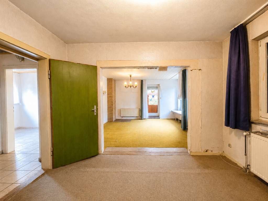 Immobilie in Hambühren - Freistehendes Einfamilienhaus mit großem Grundstück in ruhiger Lage von 29313 Hambühren - Bild 2