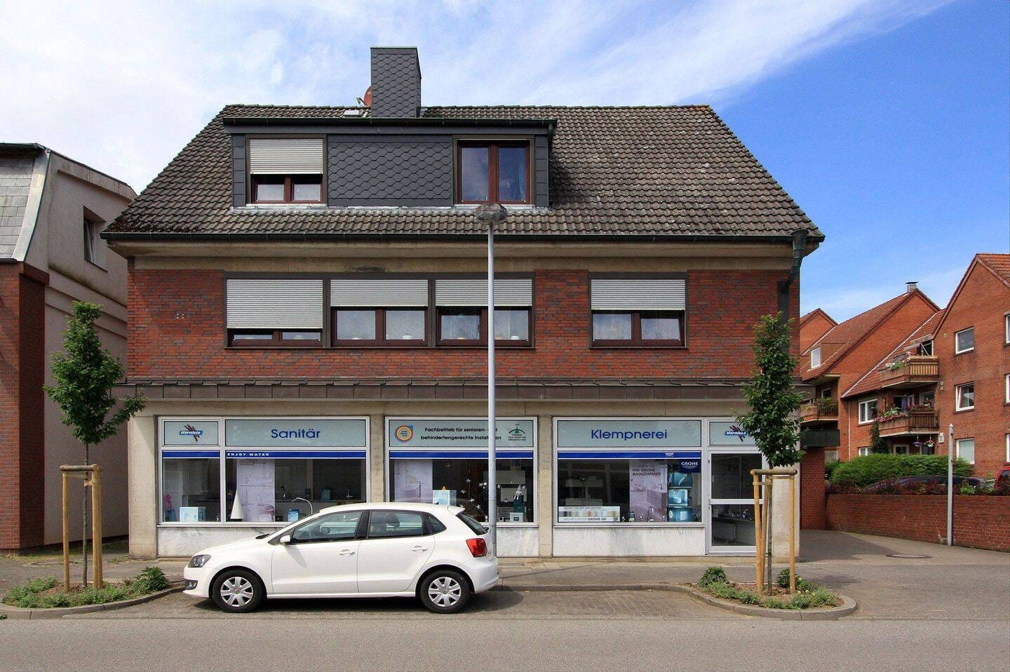 Immobilie in Giekau - Mehrfamilienhaus mit Ladengeschäft,  Garten, Werkstatt- & Lagerschuppen - Bild 1