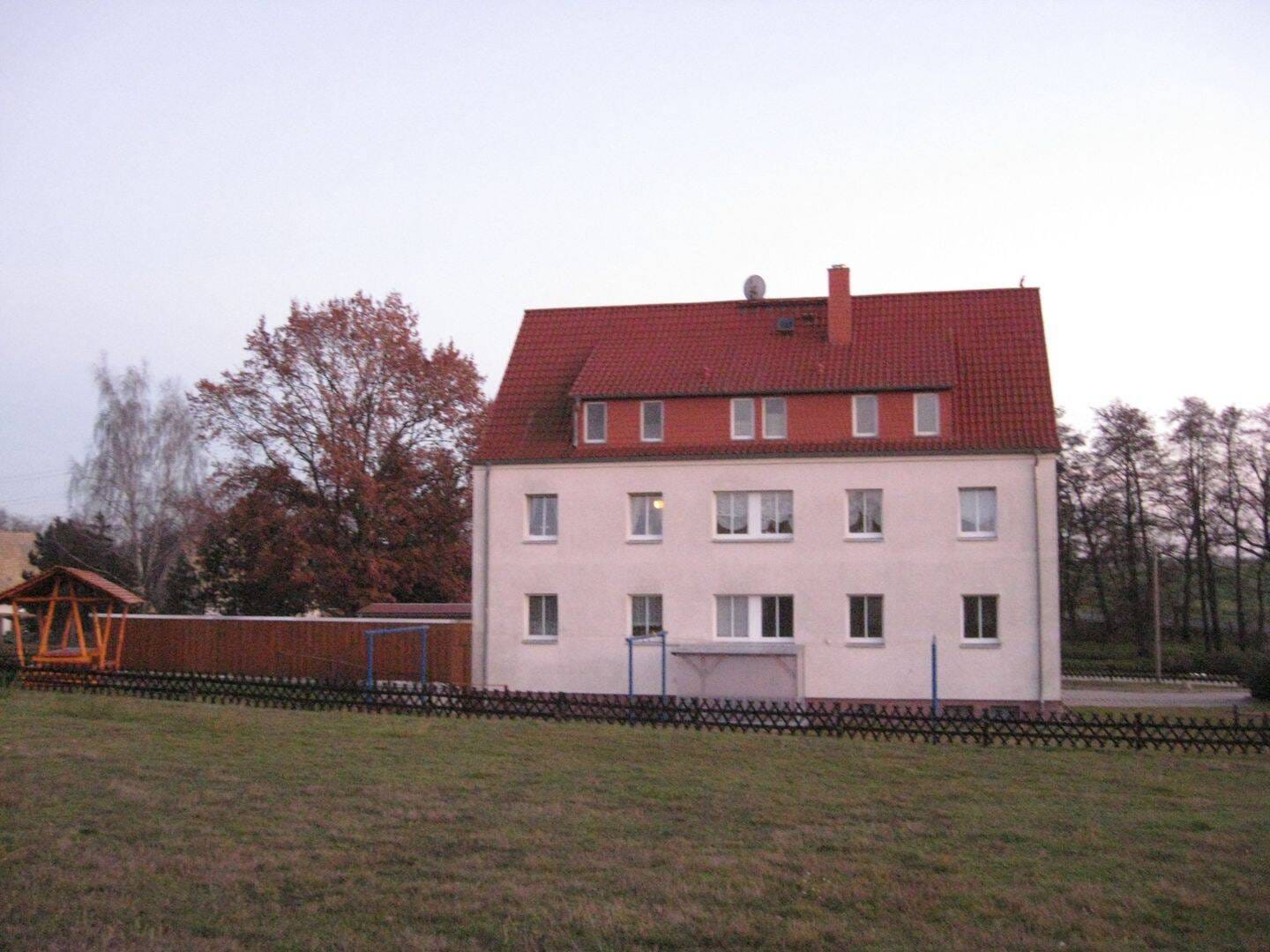 Immobilie in Dommitzsch - Attraktive Kapitalanlage:  Vollvermietetes Mehrfamilienhaus mit nachhaltiger Substanz in Greudnitz - Bild 1